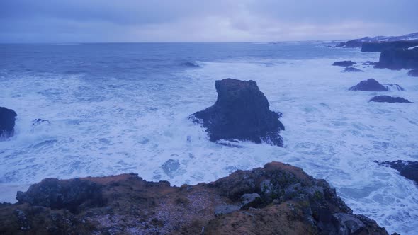 Iceland Rough Ocean Water Crashing Against Rock Cliffs In Arnarstapi 2
