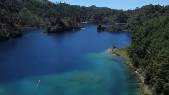 Panning drone shot of lagunas de Montebello national park alt