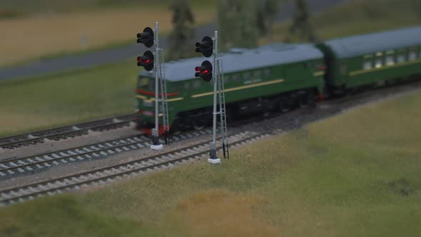 Mini Train Station Modelling. Model of Railway Station With Moving Train. Model Electric Locomotive alt