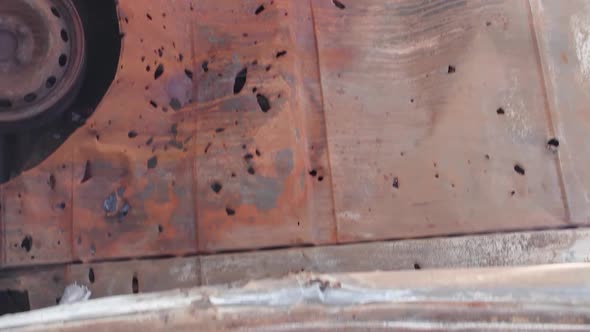 Vertical Video of the War in Ukraine  Burnt Cars in Irpin alt