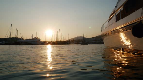 Time Lapse Sunset in the Port of the Resort Town of Bodrum, Turkey. Luxury Yacht Moored in the Bay alt