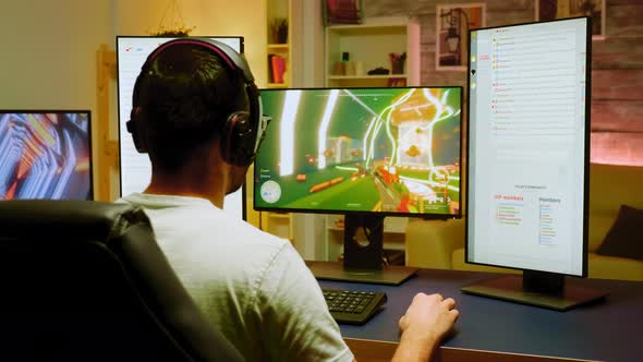 Caucasian Man with Headphones Playing Shooter Games alt