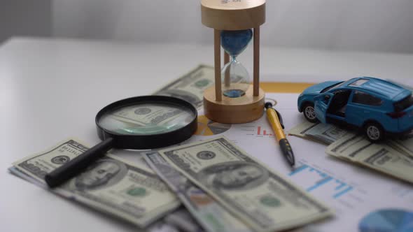 Toy Car and Sheets Drawings Money