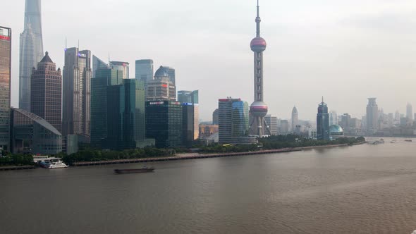 Shanghai River Cityscape Pan Up alt
