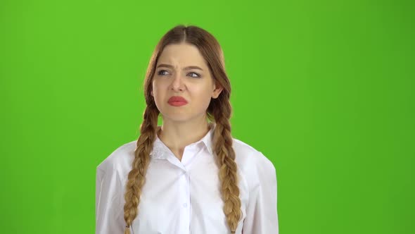 Unpleasant Smell Made the Girl Close Her Nose. Green Screen alt