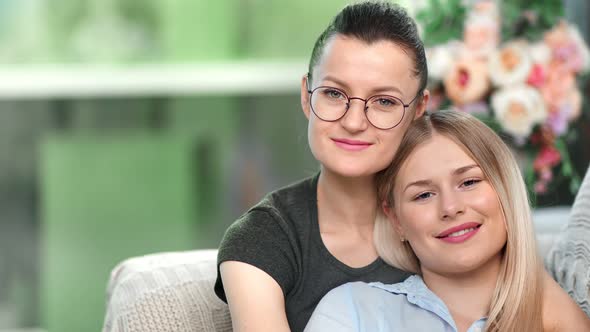 Closeup Face of Two Happy Lesbian Woman Feeling Love Smiling Hugging Relaxing Together alt