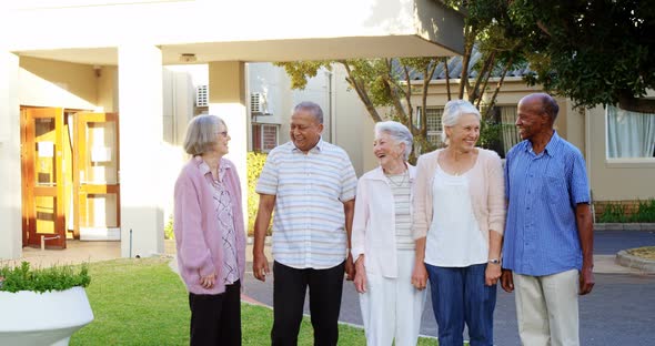 Happy senior friends interacting with each other 4k alt