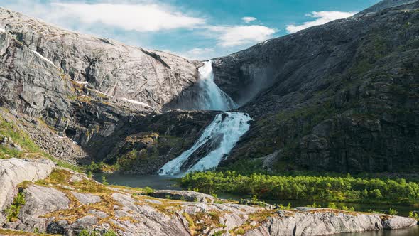 Kinsarvik, Hordaland, Norway. Waterfall Nykkjesoyfossen In Hardangervidda Mountain Plateau, Spring alt