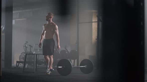 Exhausted Young Men Resting After Intensive Workout in Gym alt