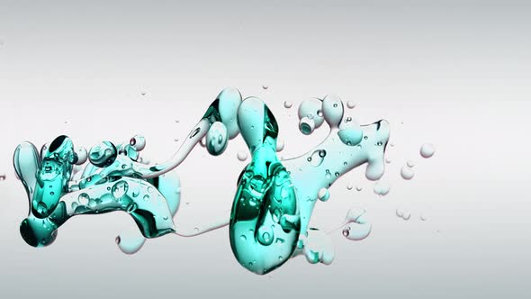 Transparent Cosmetic Turquoise Oil Bubbles and Shapes on White Background in Vertical Video Format