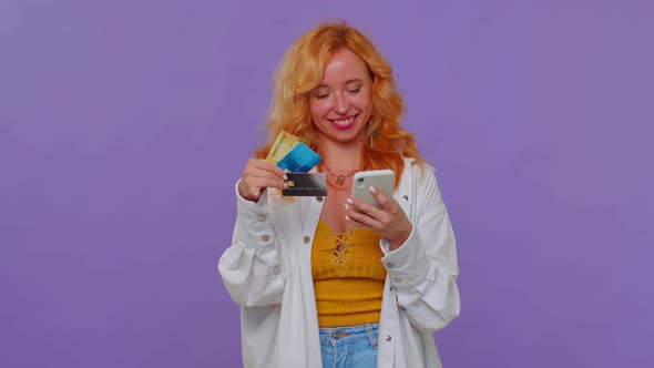 Girl Using Credit Bank Cards and Smartphone While Transferring Money Purchases Online Shopping alt