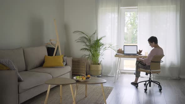 Woman Working in Spacious Interior at Home