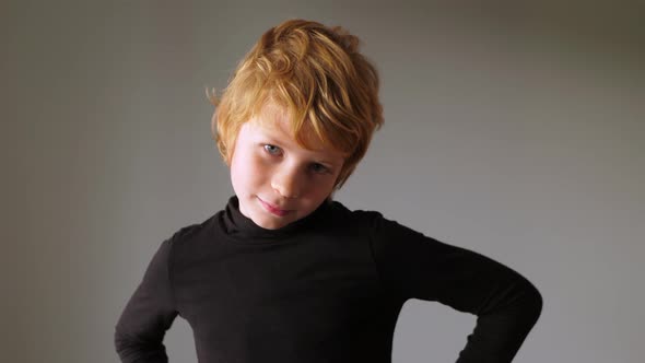 Blonde boy is skeptical and disagrees with something alt