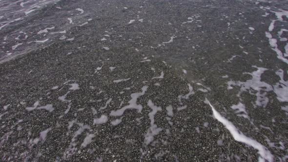 Sea Tide on a Pebble Shore