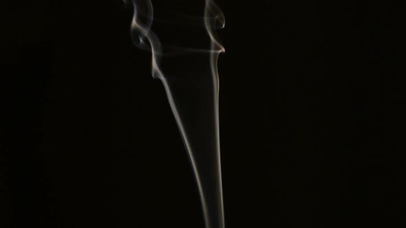 incense smoke on dark background