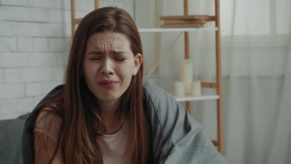 Young Lady Crying Eating Chocolate Suffering From Depression At Home alt