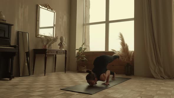 Graceful Woman Doing Yoga at Home