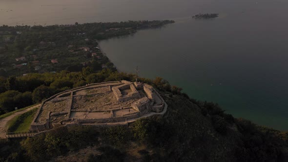 Rocca di Manerba mountain aerial view, town by Lake Garda scenic panorama, Italy alt