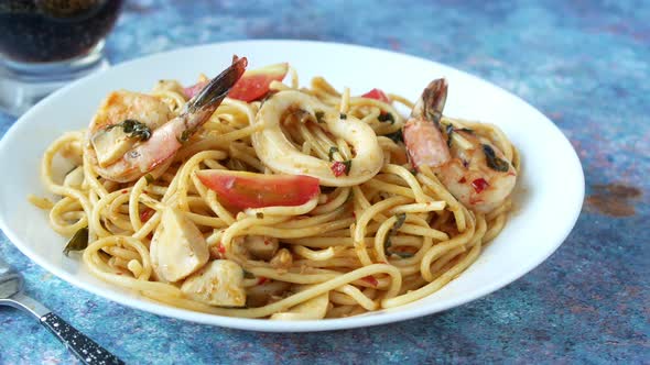 Plate of Sea Food Pasta on Table alt