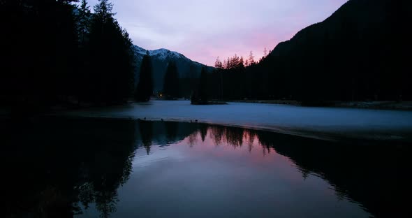 Frozen lake and sunset, slowmotion