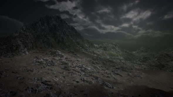 Dramatic Storm Sky Over Rough Mountains alt