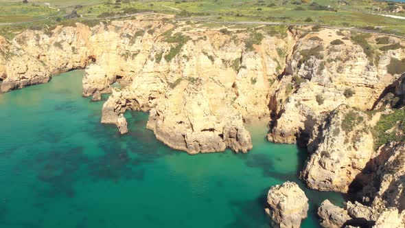 Marvellous Algarve Coastline rocky formations in Ponta da Piedade, Lagos, Portugal alt