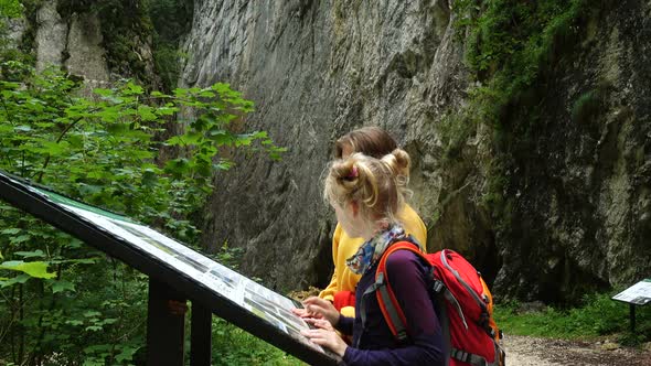 Active Family Hiking By The Canyon  alt
