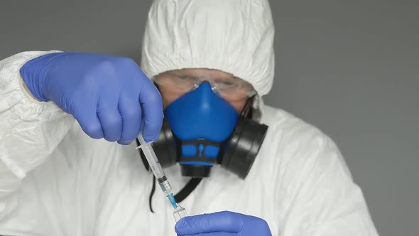 Biologist in a Protective Suit Mask