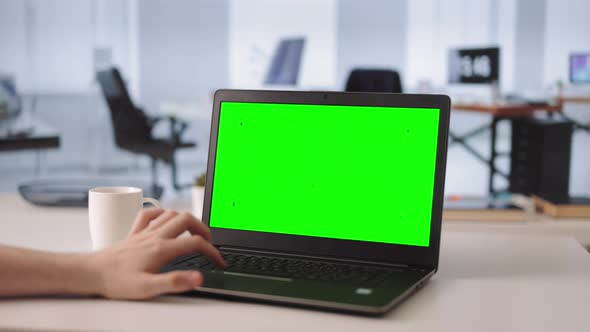 Man with Green Screen Laptop