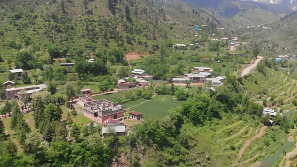 Aerial Over Swat Valley Village At Gabin Jabba In Pakistan. Dolly Forward alt