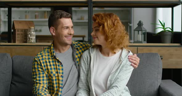 Young Man and Woman Are Looking at Each Other alt