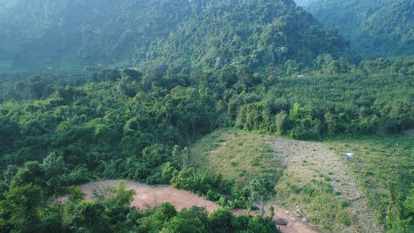 Natural landscapes around the city of Vang Vieng in Laos seen from the sky alt