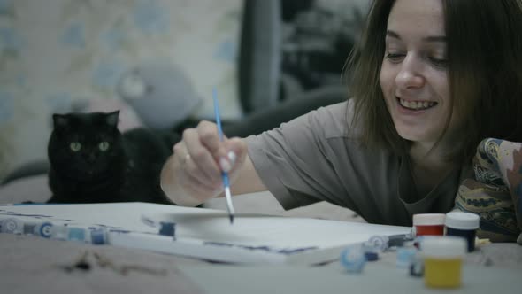 Woman relaxing with her pet  alt