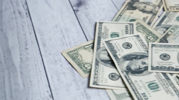 Hundred Dollar Banknotes on a Table. Dollar Bills Money Close-up. Background with Money American alt