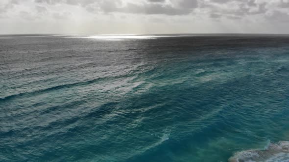 Turquoise Ocean Water Wave View From Height to the Shining and Sparkling Surface alt
