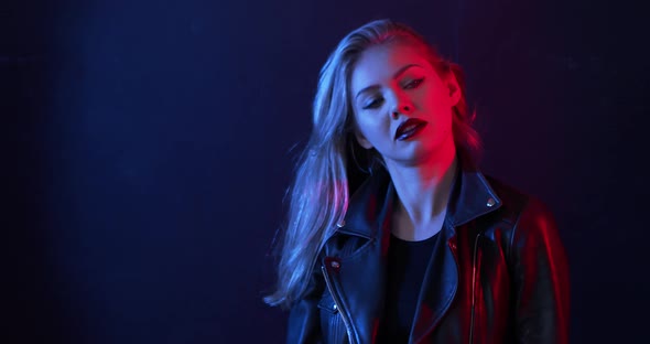 Rock Stylized Fashion Woman Posing in Studio alt