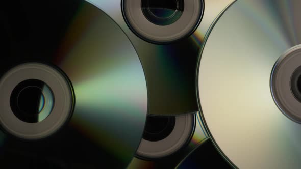 Rotating shot of compact discs - CDs  alt