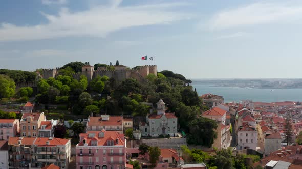 Elevated View of Medieval Saint George Castle Above Historic Houses in Downtown alt