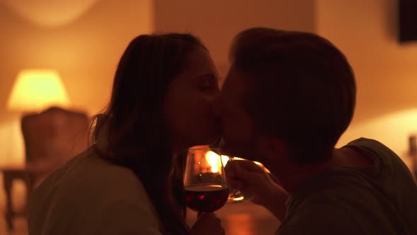 Couple Toast With Red Wine