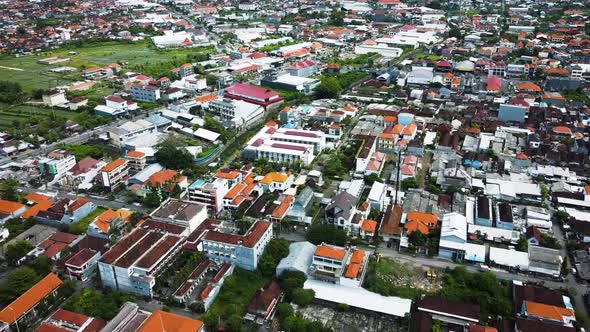 Wonderful Denpasar city drone with houses and rice field footage in Bali. This footage was shot duri alt