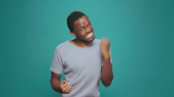 African American Man Celebrating Achievement and Success alt