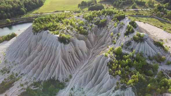 Sand Hills of Quarry With a Pond and Abandoned Prison in Rummu Estonia Europe. Aerial Dron Shoot. alt