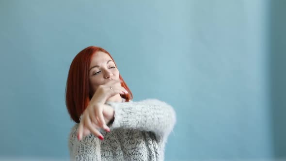 Happy Carefree Red-haired Woman Dancing