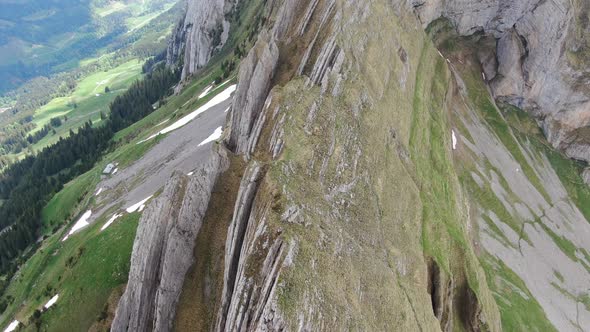 Flight over the Shafler mountain ridge in Appenzell Alps, Switzerland, Europe alt