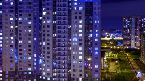 night window timelapse. architecture of the night city, urbanistic view of the building