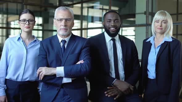 Business People in Suits Looking Camera, Career Development, Consulting Service alt