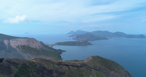 Aerial View of a Beautiful Landscape Sea Islands Green Mountain Slope in a Summer Journey alt