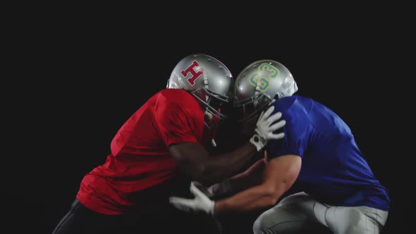 Two American football players in action alt