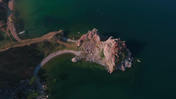 Aerial Drone Footage. Summer. Lake Baikal. Olkhon Island. Rocks in the Siberia. Cape Burkhan alt