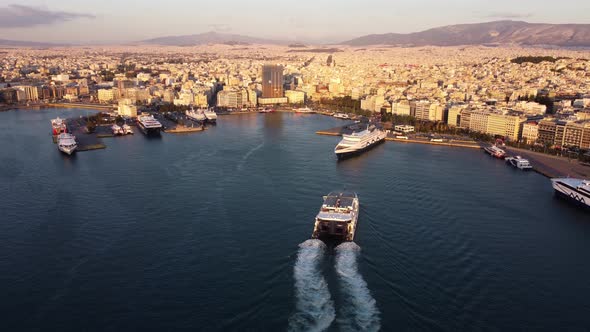 Drone View of Barges Off the Coast of Athens with the City in the Background alt